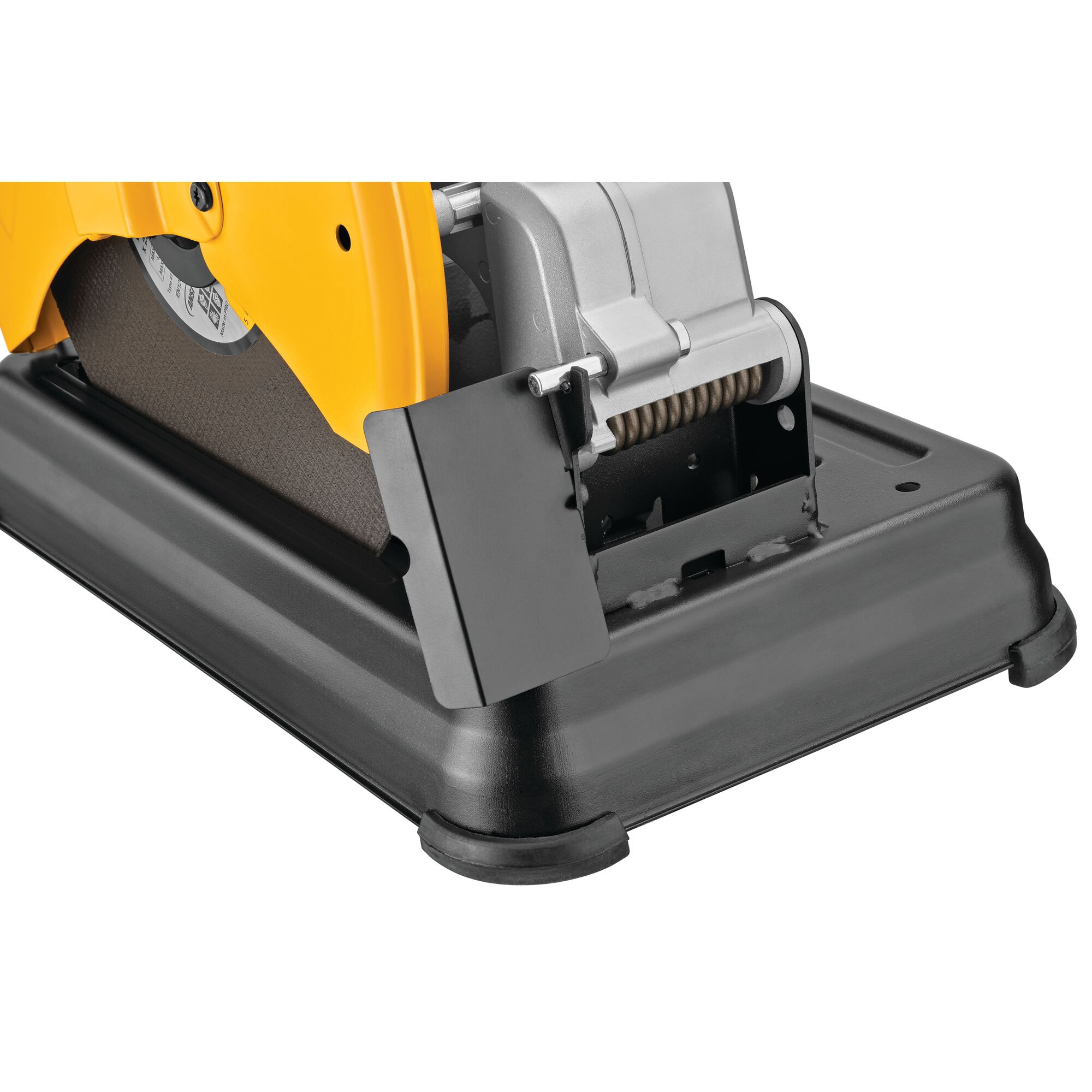 Close-up image of the base and partial blade guard of a DEWALT chop saw, showing details of the blade and protective casing.