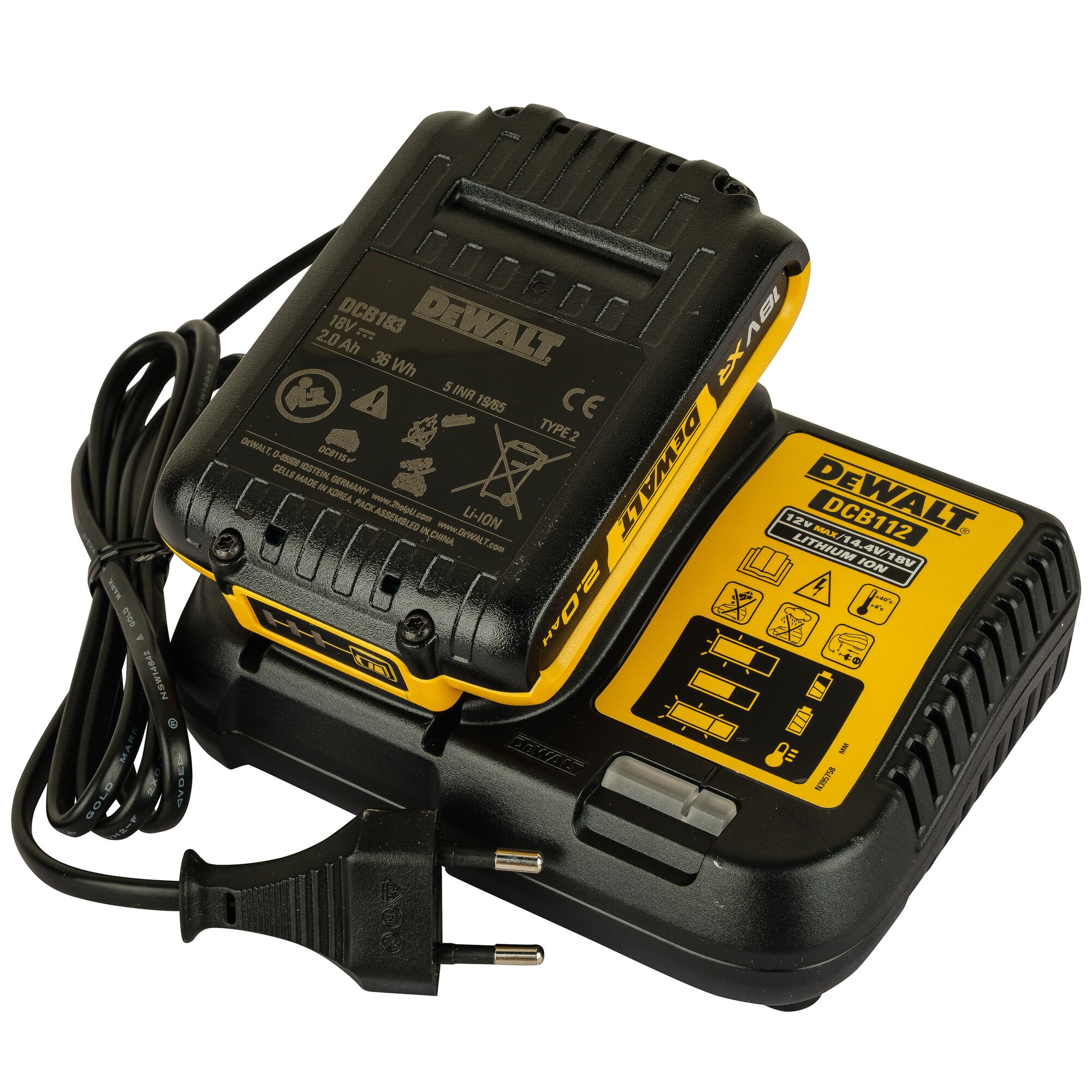 A DEWALT battery charger and a DEWALT 18V lithium-ion battery pack with a European plug. The charger has clear yellow and black labeling with instructions and specifications visible.