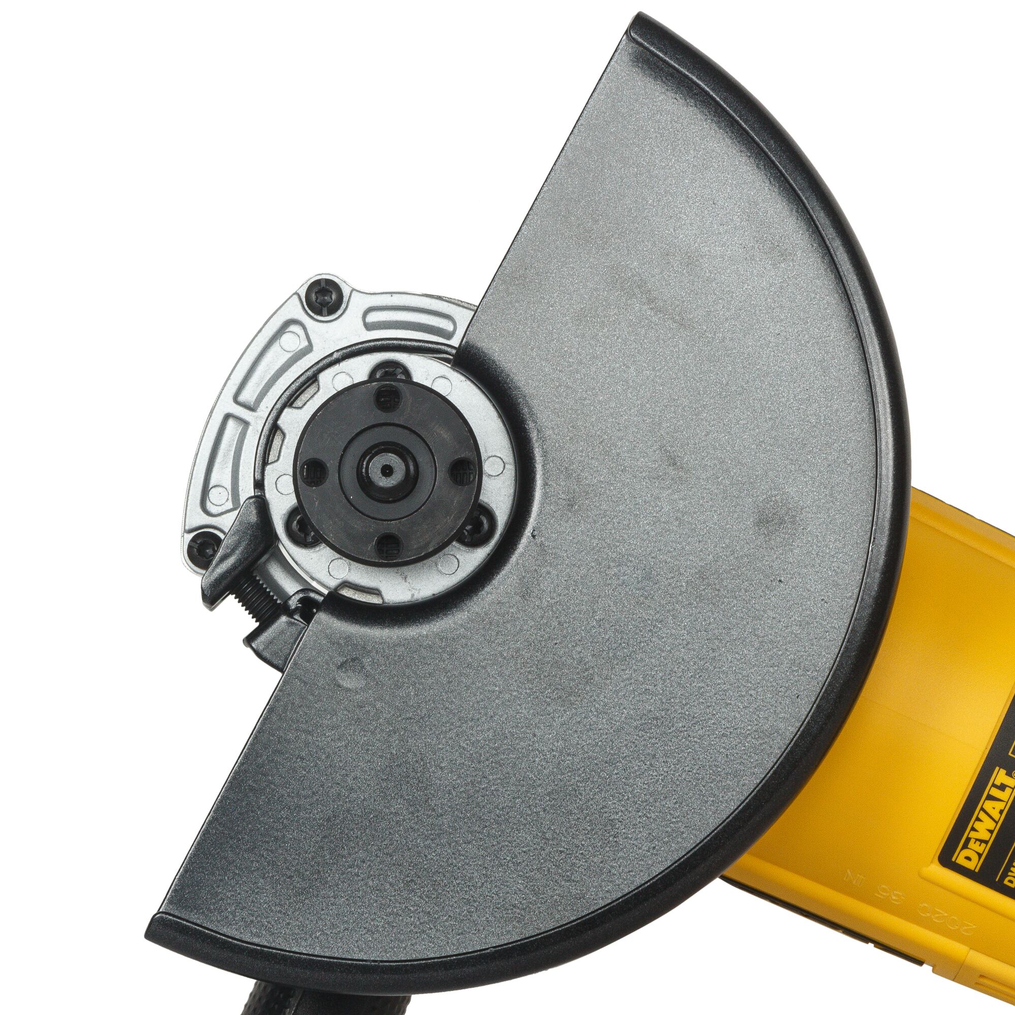 Close-up view of a DEWALT DWE492 angle grinder showing the metal grinding disc and protective guard.