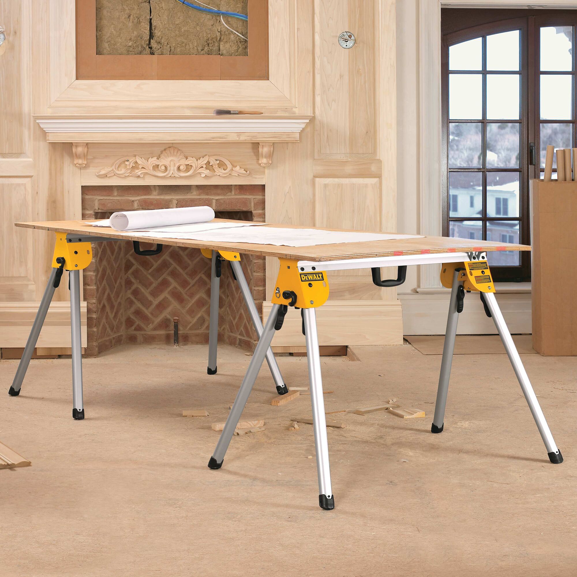 Double bevel sliding compound miter saw being used.