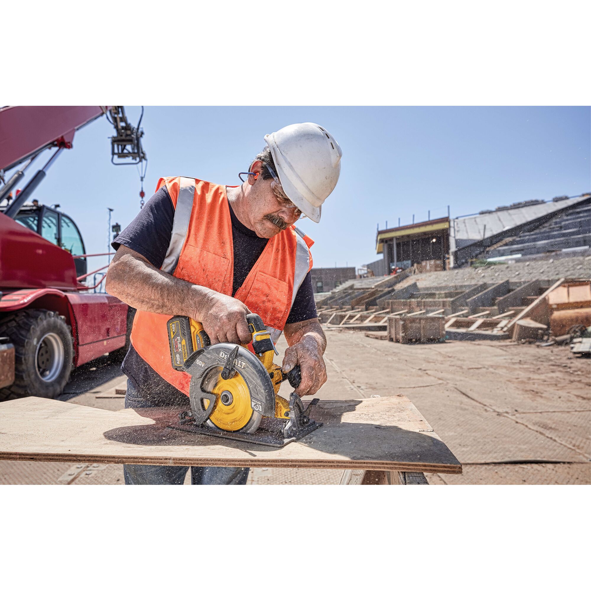 20 Volt to 60 Volt 9 AMP hours Lithium-Ion Battery-powered Circular Saw being used by a construction worker to cut a wooden sheet at a construction site
