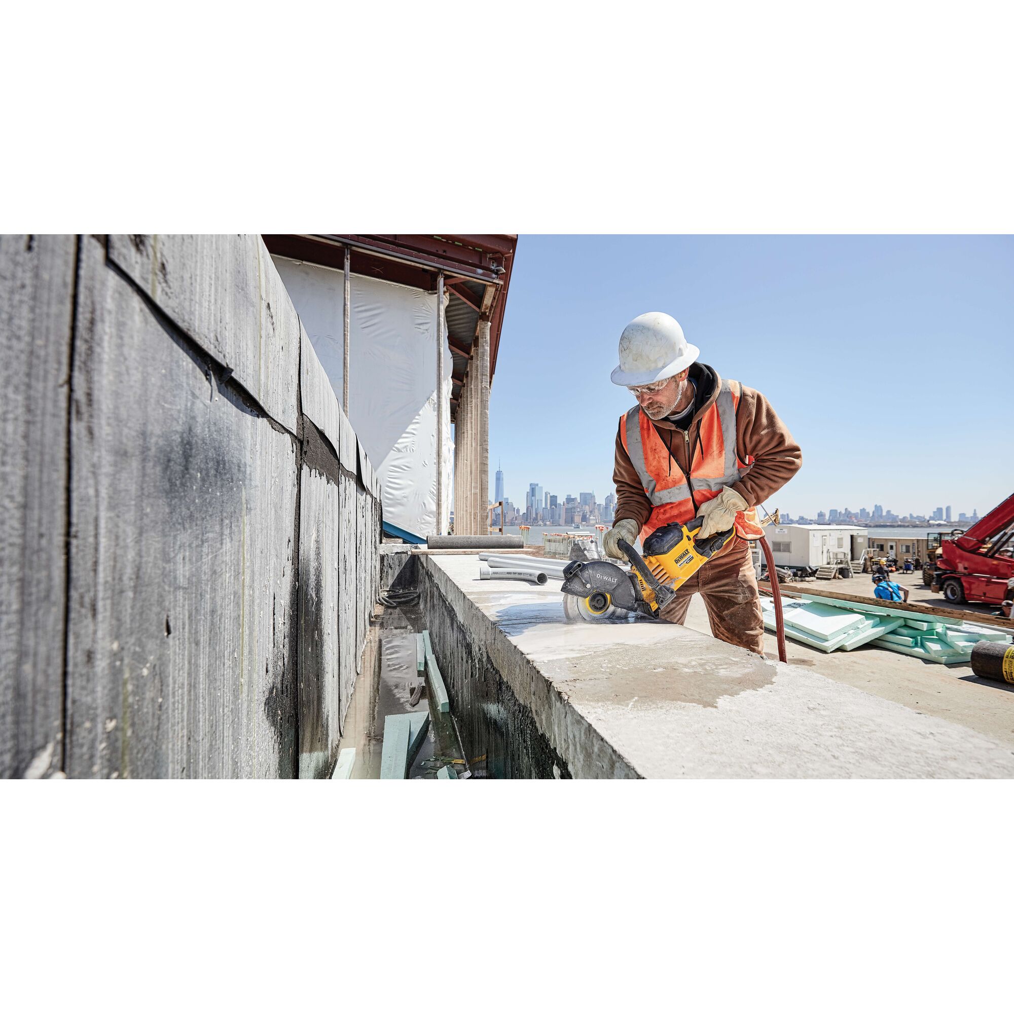20 Volt to 60 Volt 12 AMP hours Lithium Ion Battery powered Circular Saw being used by a construction worker to cut concrete at a construction site